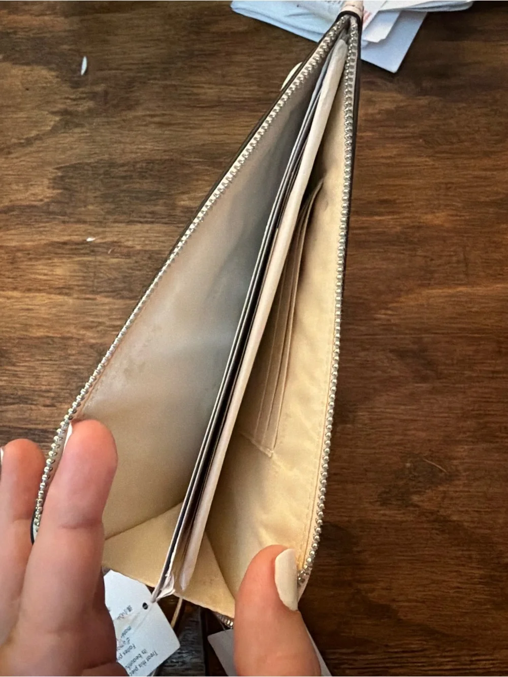 kate spade pale pink zip-around wallet